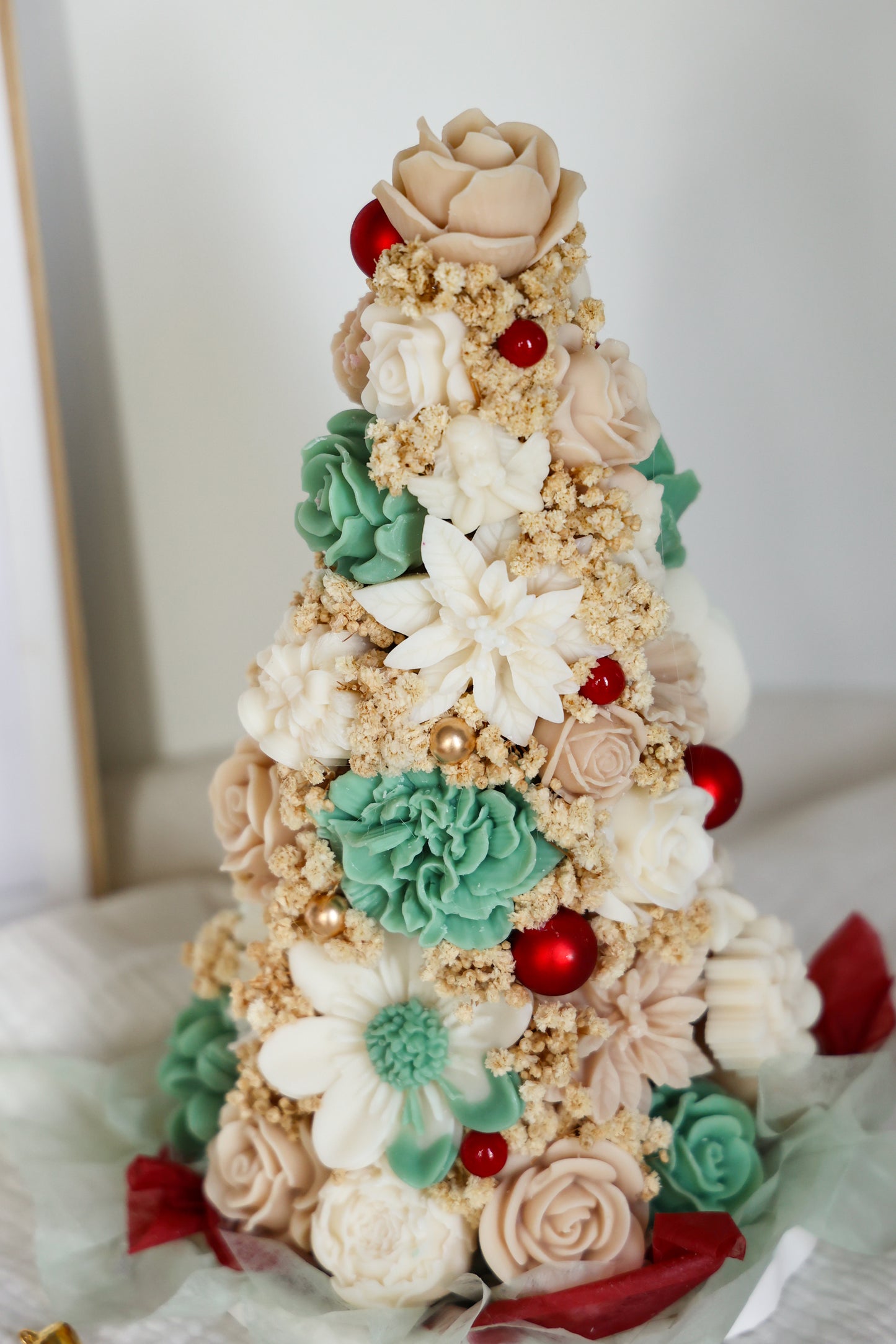 Weihnachtsblumentanne aus Wachsblüten